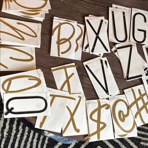 Gold and Black Metal Letters